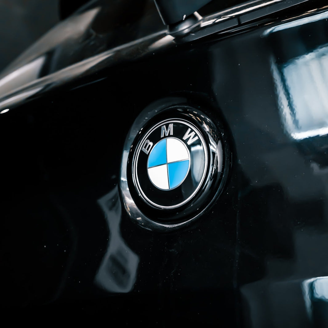 BMW 1 Series Rear Badge Surround Cover In Gloss Black (F20/F21)