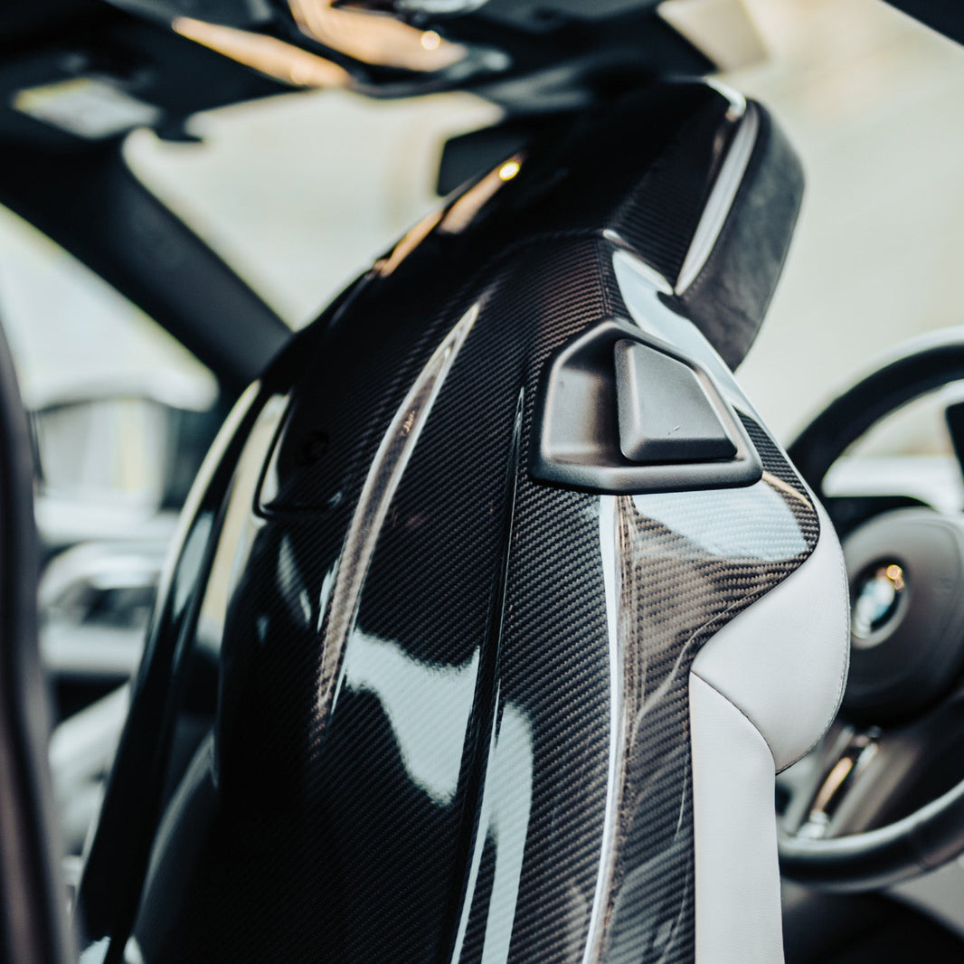 Custom Carbon BMW G Series Seat Back Covers In Gloss Carbon Fibre (4 Door Vehicles)