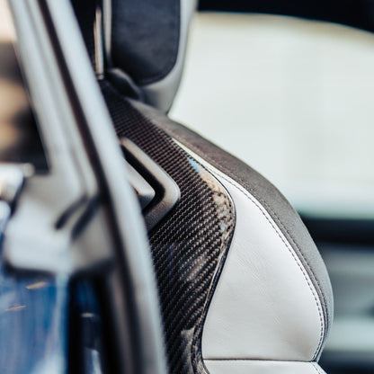 Custom Carbon BMW G Series Seat Back Covers In Gloss Carbon Fibre (4 Door Vehicles)