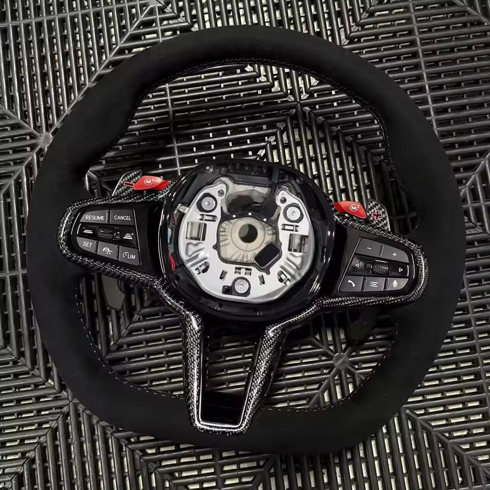 Aftermarket steering wheel fits any BMW with any button configuration, with or without heating and driver assist. BMW CS M4 G01 G02 G05 G06 G07 G30 G31 G32 G82 G42 G14 G20 G21 G80 G81 G22 G23 G26 X1 X3 X4 X5 X6 X3M X4M X5M X6M M3 M4 M5 M8 F90 F91 F92 F93