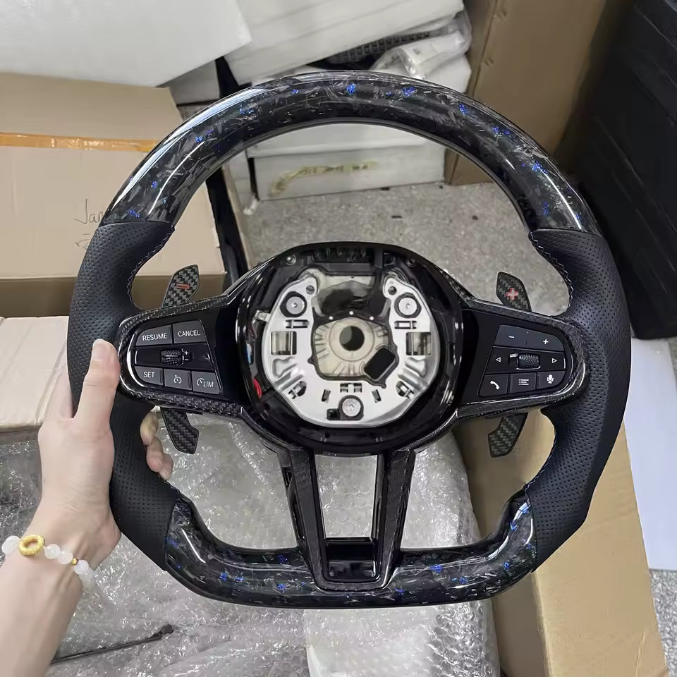 Aftermarket steering wheel fits any BMW with any button configuration, with or without heating and driver assist. BMW CS M4 G01 G02 G05 G06 G07 G30 G31 G32 G82 G42 G14 G20 G21 G80 G81 G22 G23 G26 X1 X3 X4 X5 X6 X3M X4M X5M X6M M3 M4 M5 M8 F90 F91 F92 F93